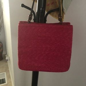 ST Johns Bay hot pink straw bag